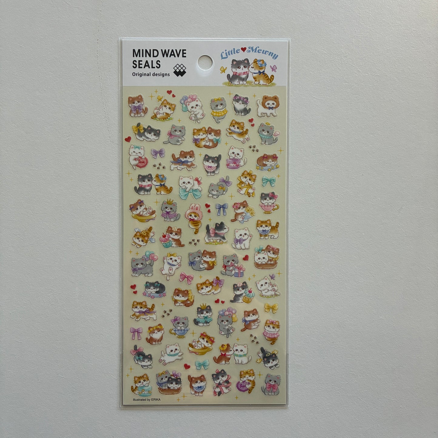 Sheet of decorative stickers with cartoon cats on a gray background