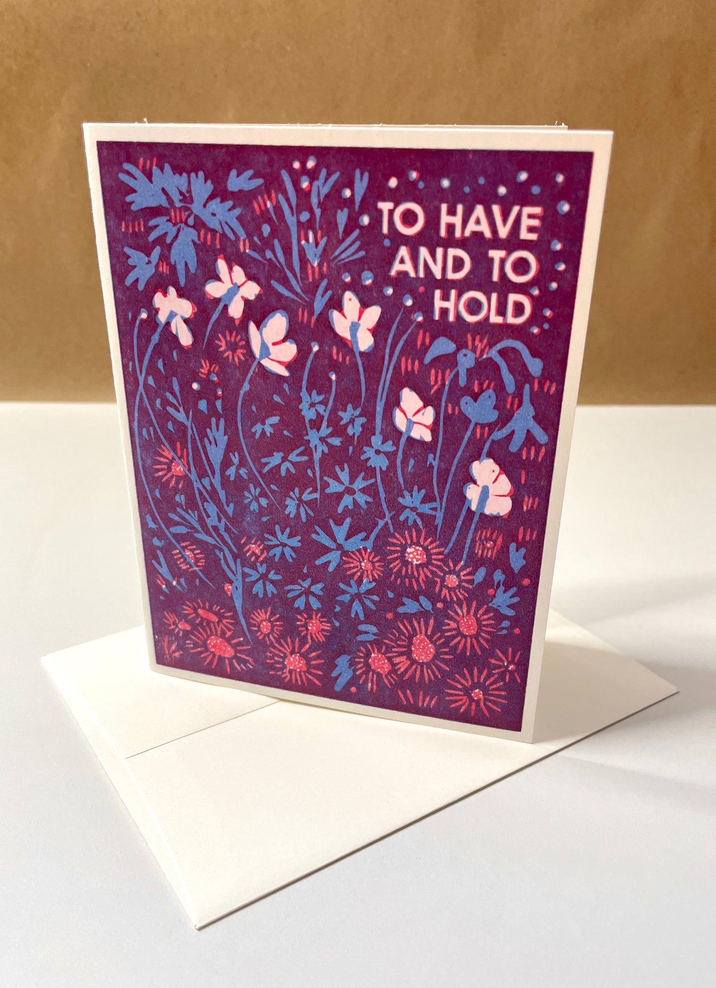Purple and blue floral card with text saying “to have and to hold”