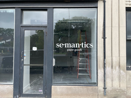 Image of storefront windows of Semantics Paper Goods