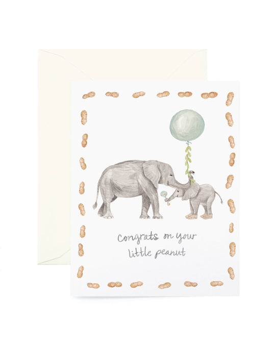 Newborn baby card with two elephants and a balloon on a white background