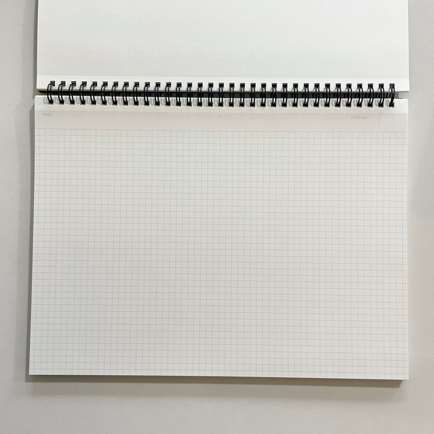 Mnemosyne A4 Grid Notebook