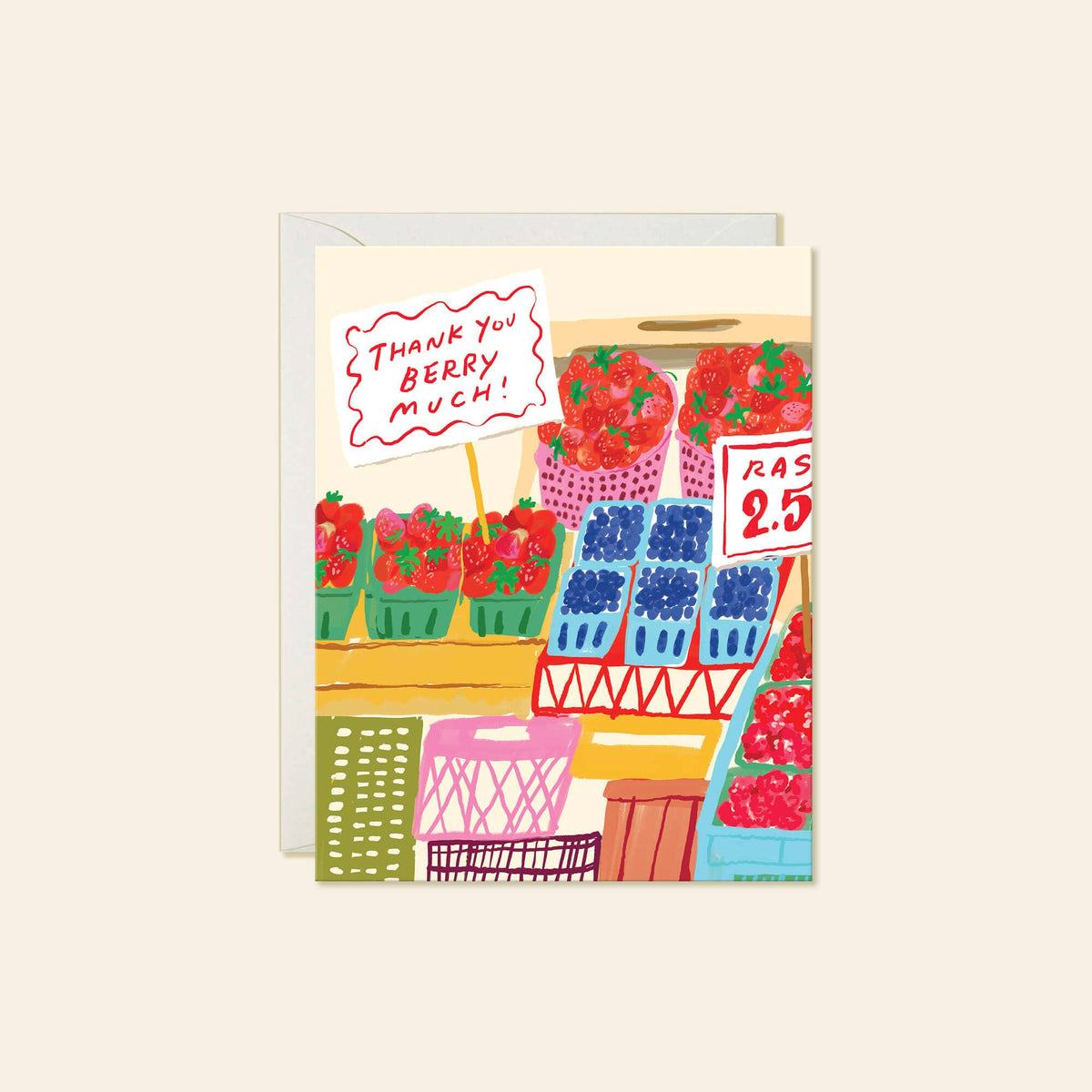 A greeting card featuring a colorful hand-drawn illustration of a fruit stand with strawberries, blueberries, and a sign that reads 'THANK YOU BERRY MUCH!'. The card is shown slightly offset from a light gray envelope against a warm cream background.