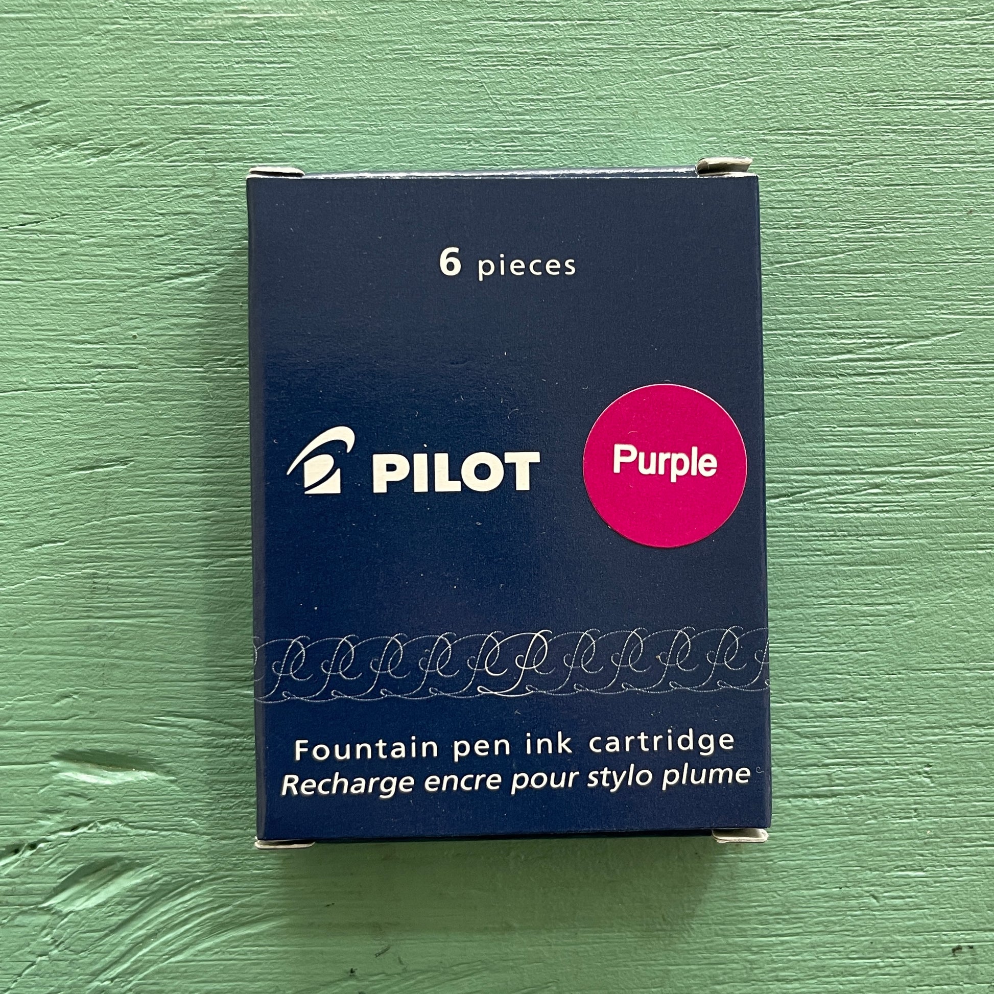 A box of Pilot brand fountain pen ink cartridges in purple color, containing 6 pieces.