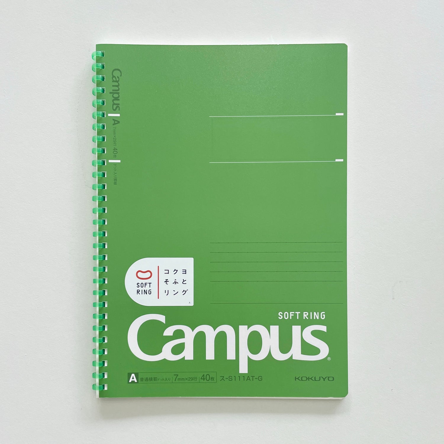 A green Campus brand soft ring bound notebook 