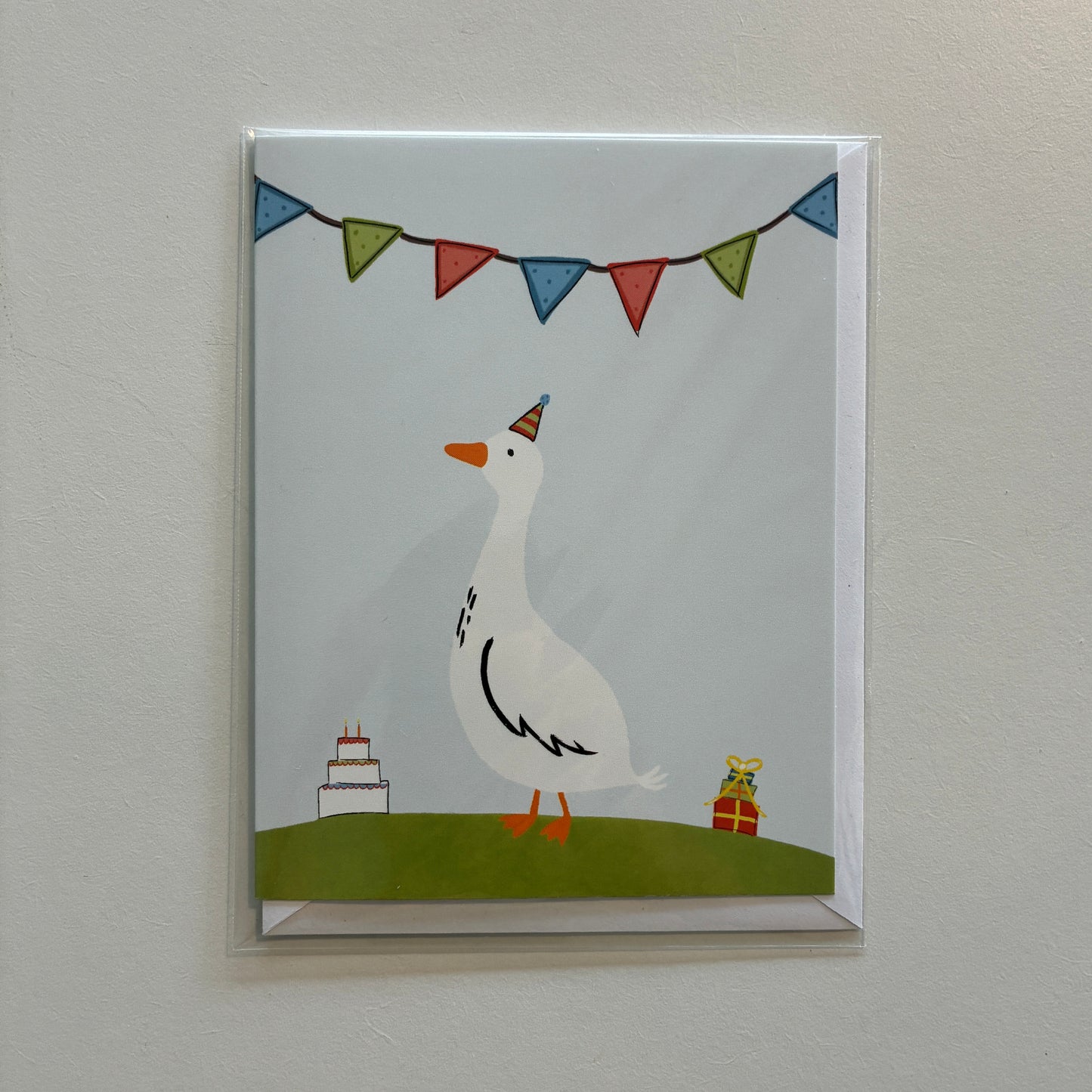 Illustration of a goose with a party hat