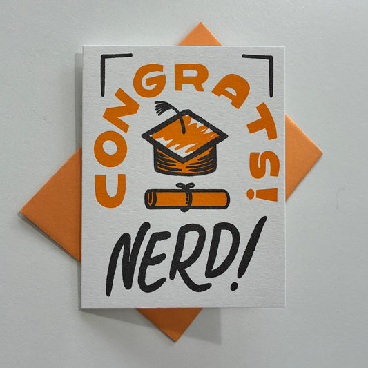 Greeting card with 'Congrats Nerd!' text and graduation cap illustration on a white background.