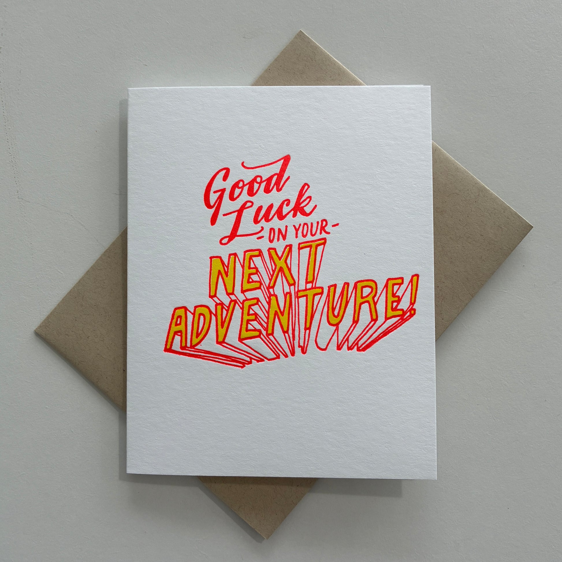 Greeting card with 'Good Luck on Your Next Adventure!' text on a white background