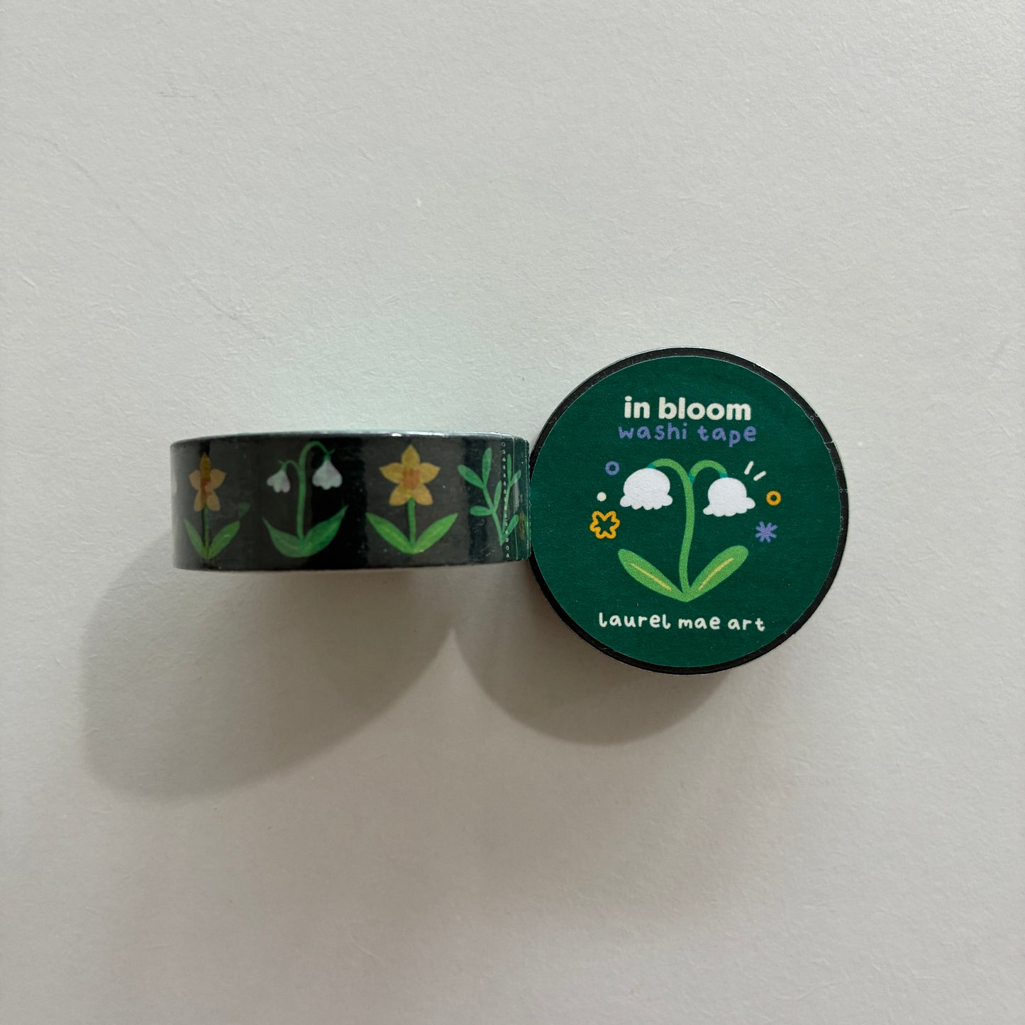 Dark green washi tape with floral designs