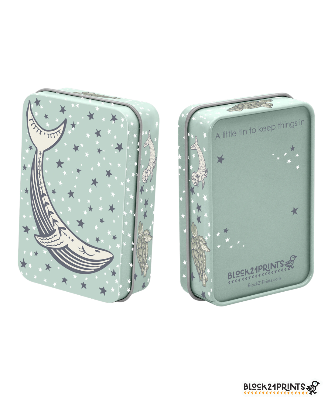 Two mint green tins with star patterns and whale illustrations on a white background.